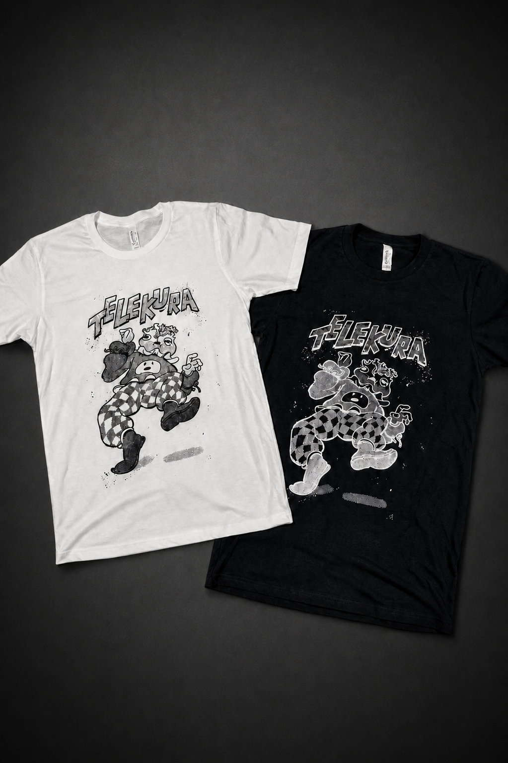 White and black TELEKURA graphic T-shirts arranged on a charcoal vignette backdrop